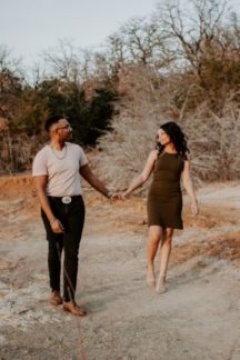 Young black couple enjoying a walk in nature